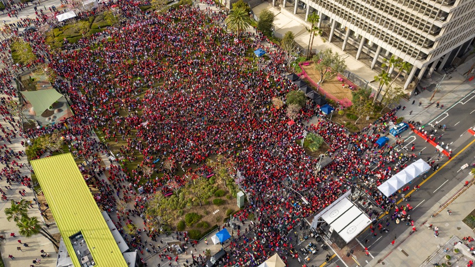 An aerial view of a UTLA rally filling the park and surrounding streets